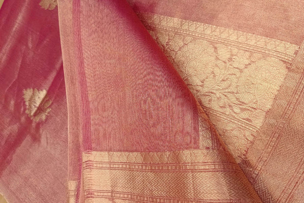 Pink silk tissue handloom Banarasi saree with floral motifs in gold.