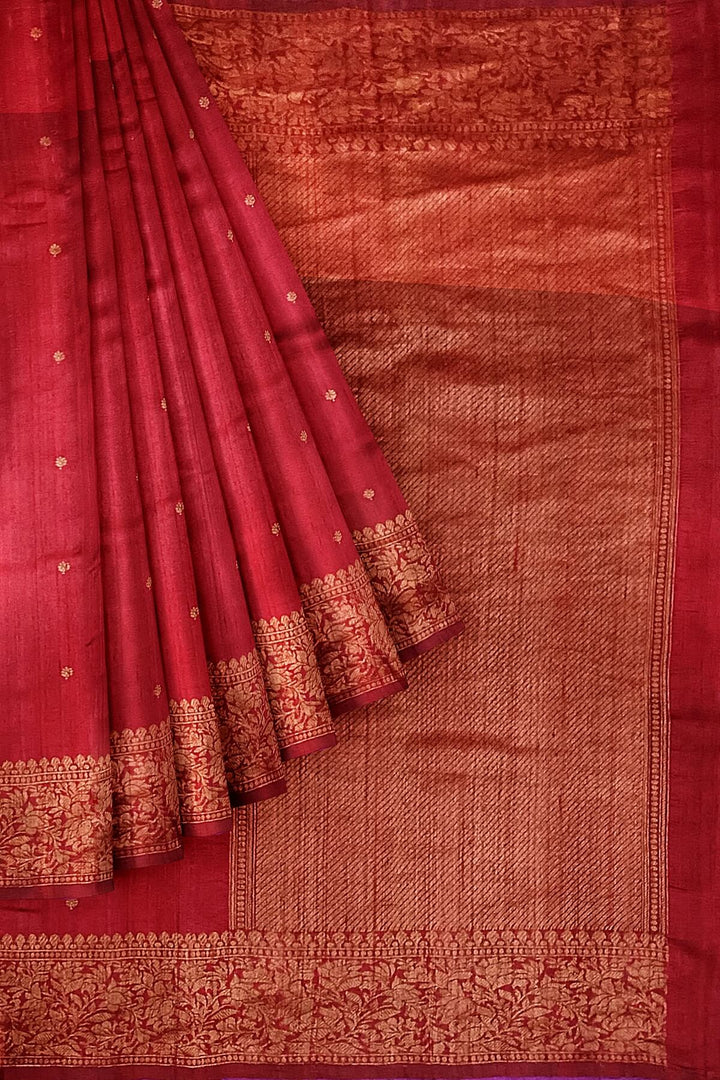 Handloom Banarasi katan pure silk saree in maroon in dupion finish with small motifs .