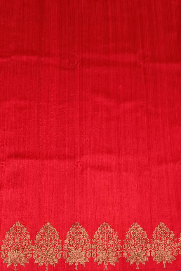 Handloom Banarasi katan pure silk saree in royal blue in dupion finish with floral motifs .