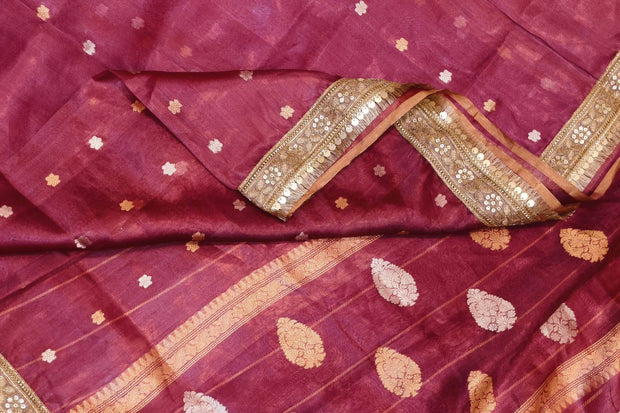 Handloom Banarasi silk tissue saree in wine with floral motifs