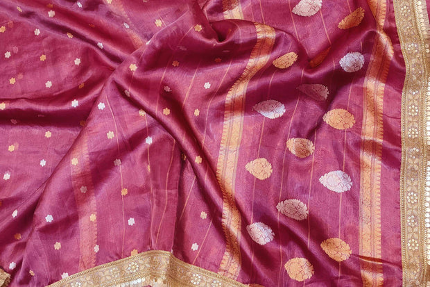 Handloom Banarasi silk tissue saree in wine with floral motifs