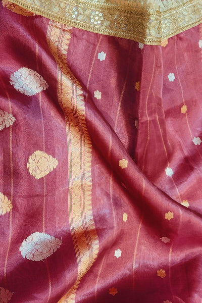 Handloom Banarasi silk tissue saree in wine with floral motifs