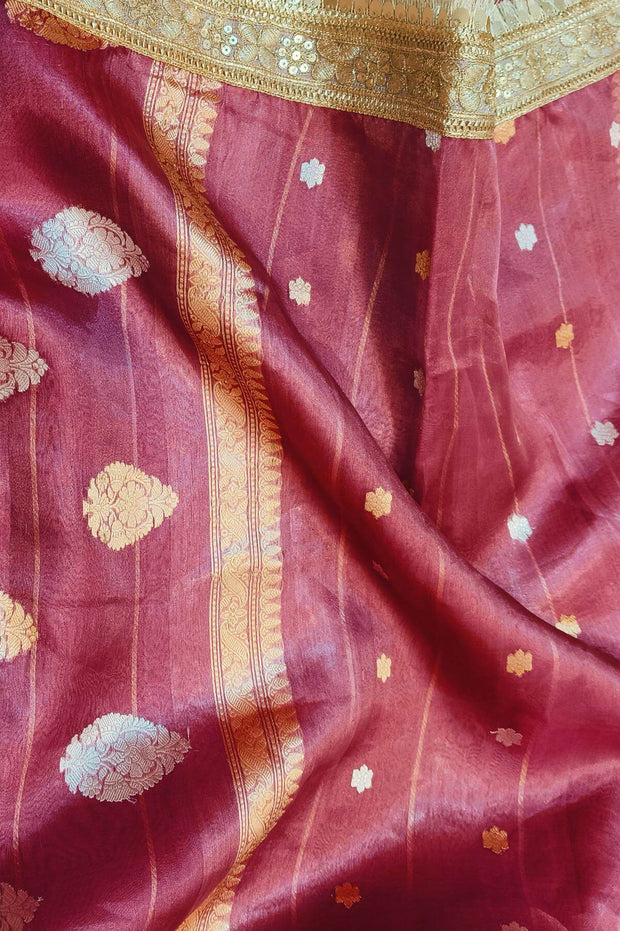 Handloom Banarasi silk tissue saree in wine with floral motifs