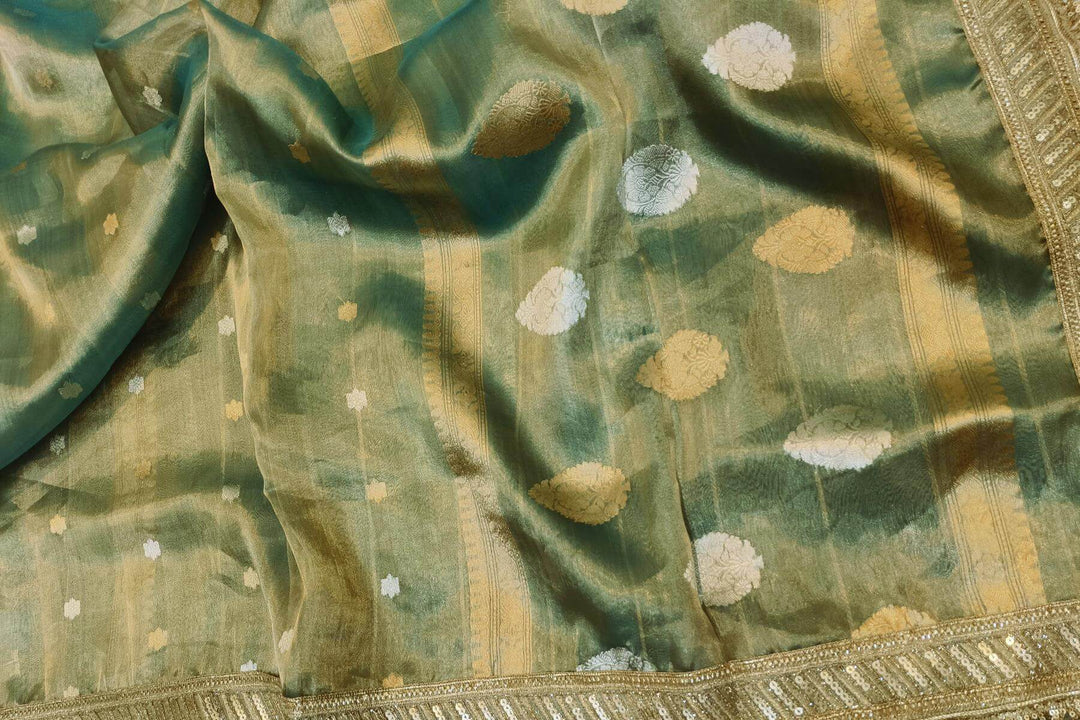 Handloom Banarasi silk tissue saree in sage green with floral motifs