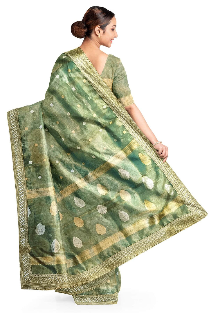 Handloom Banarasi silk tissue saree in sage green with floral motifs