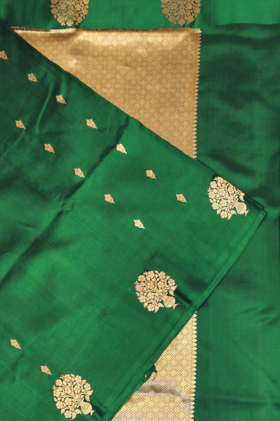 Banarasi  katan pure silk saree in bottle green