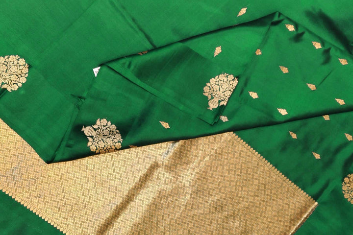 Banarasi  katan pure silk saree in bottle green
