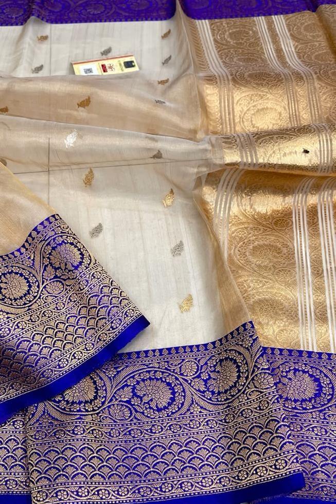 Banarasi silk tissue saree in  gold with small motifs