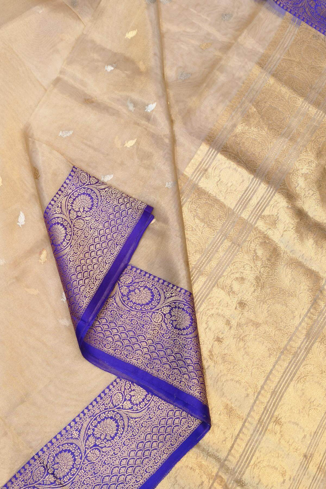 Banarasi silk tissue saree in  gold with small motifs