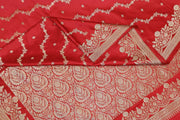 Banarasi mashru silk saree in  magenta in leheriya pattern with motifs .