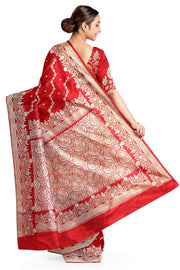 Banarasi mashru silk saree in  magenta in leheriya pattern with motifs .