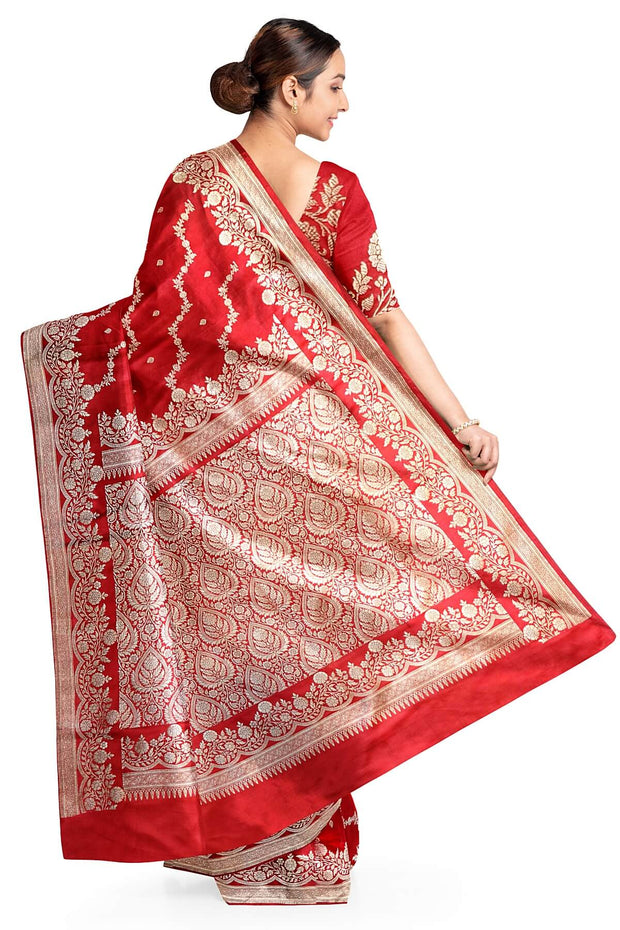 Banarasi mashru silk saree in  magenta in leheriya pattern with motifs .