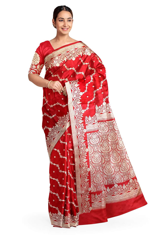 Banarasi mashru silk saree in  magenta in leheriya pattern with motifs .