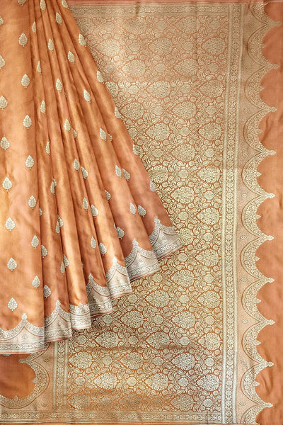 Banarasi mashru silk saree in  peach  with floral motifs