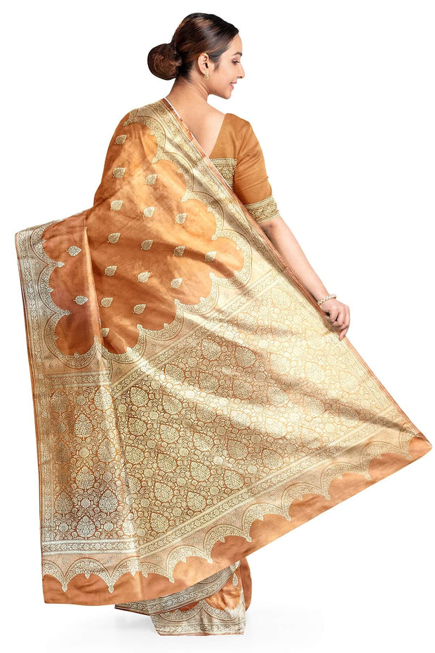 Banarasi mashru silk saree in  peach  with floral motifs