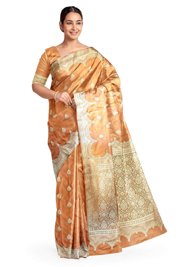 Banarasi mashru silk saree in  peach  with floral motifs
