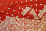 Banarasi mashru silk saree in  red  with floral motifs