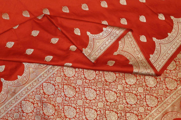 Banarasi mashru silk saree in  red  with floral motifs