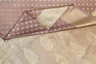 Banarasi mashru silk saree in  mauve  with floral motifs