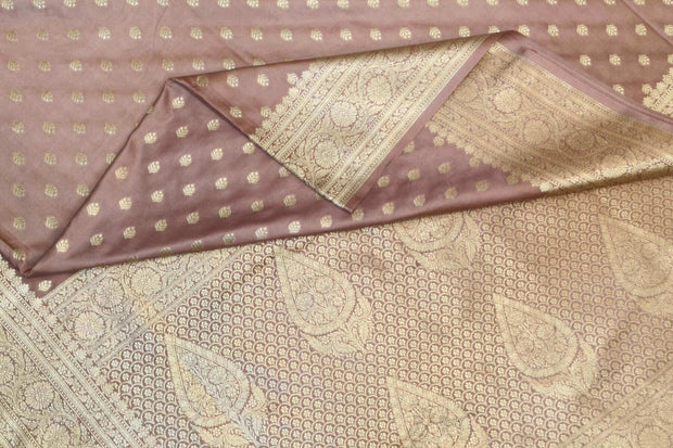 Banarasi mashru silk saree in  mauve  with floral motifs