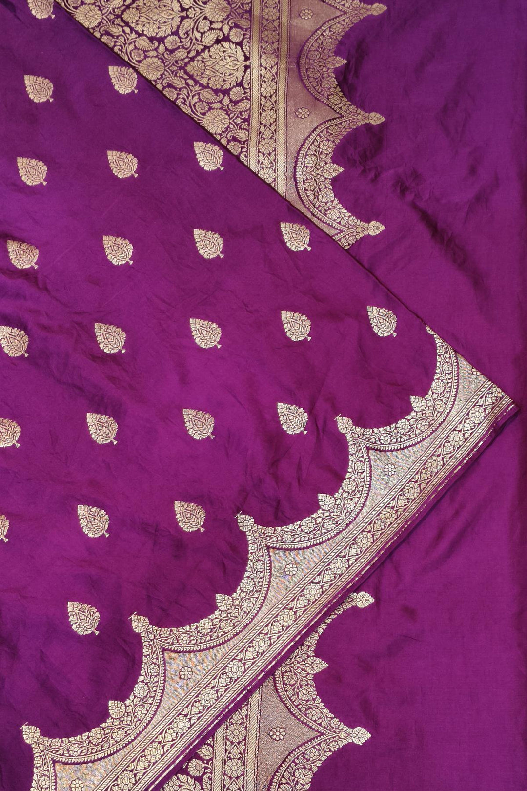 Banarasi mashru silk saree in  purple with floral motifs