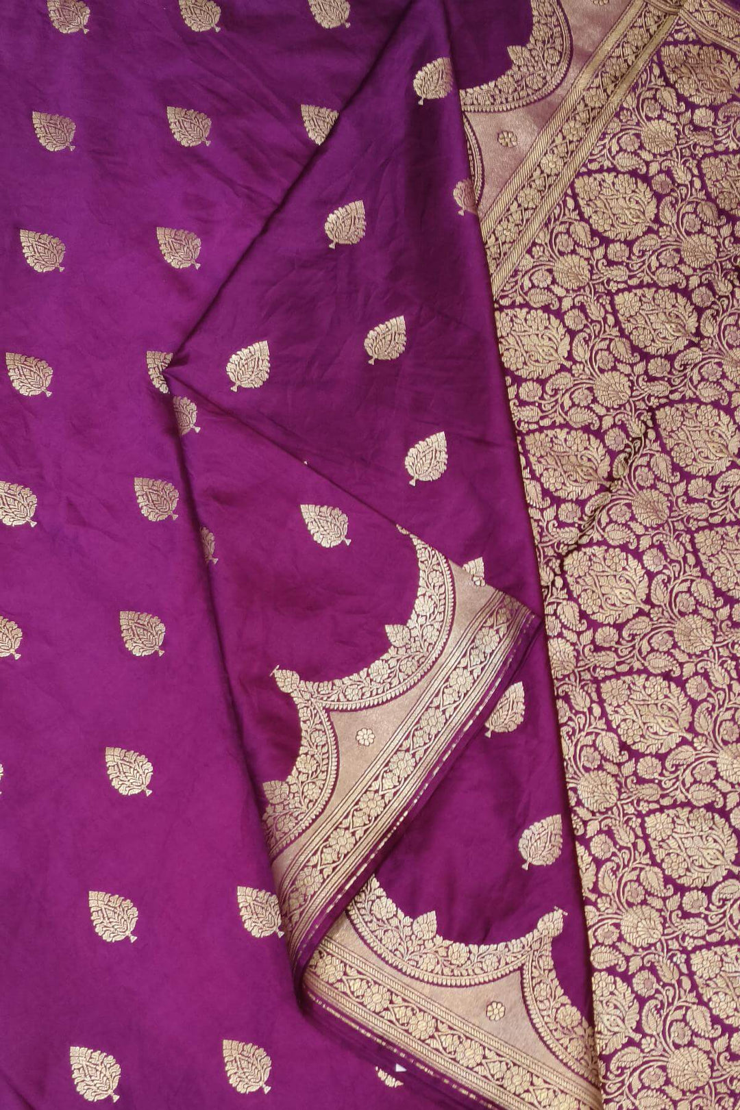 Banarasi mashru silk saree in  purple with floral motifs