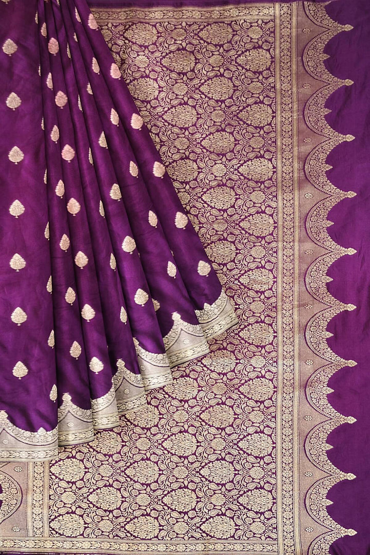 Banarasi mashru silk saree in  purple with floral motifs