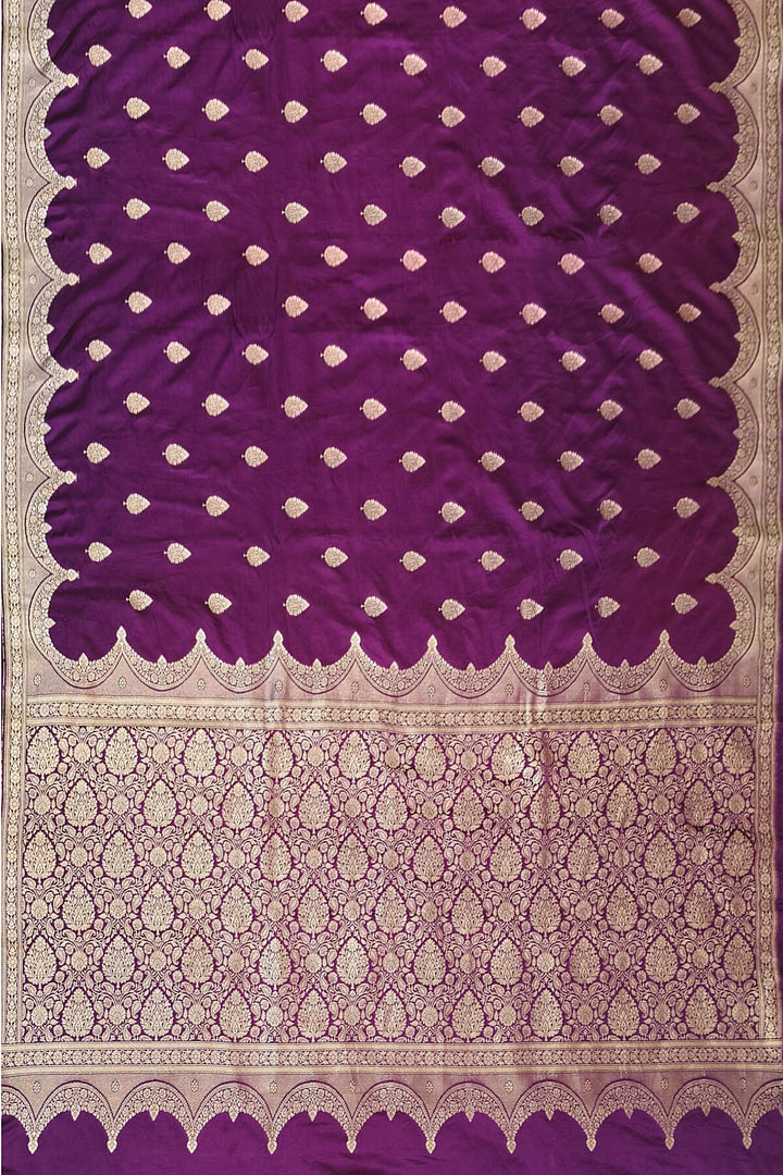 Banarasi mashru silk saree in  purple with floral motifs