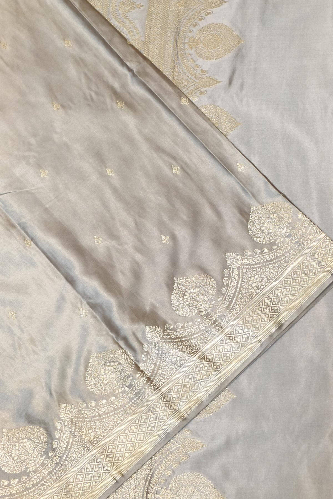 Banarasi mashru silk saree in  grey  with floral motifs