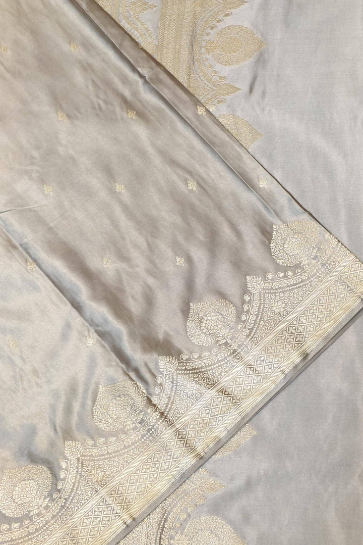Banarasi mashru silk saree in  grey  with floral motifs