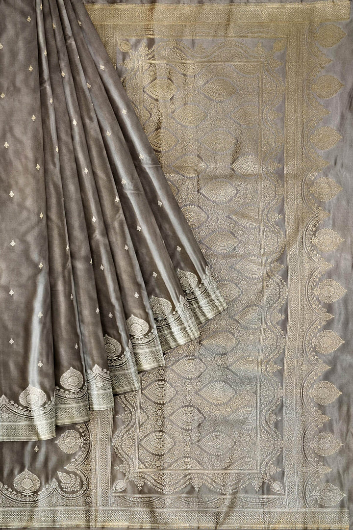 Banarasi mashru silk saree in  grey  with floral motifs