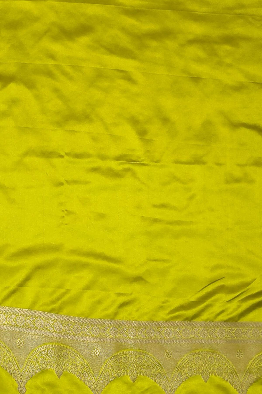 Banarasi mashru silk saree in  radium green  with floral motifs