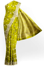 Banarasi mashru silk saree in  radium green  with floral motifs