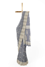 Banarasi silk chiffon  saree in bluish grey with silver  buttis &  border
