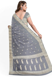 Banarasi silk chiffon  saree in bluish grey with silver  buttis &  border