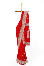 Banarasi silk chiffon  saree in red with silver  buttis &  border