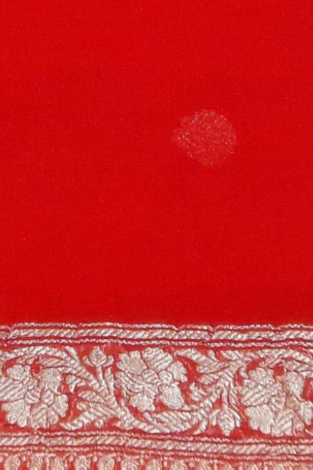 Banarasi silk chiffon  saree in red with silver  buttis &  border