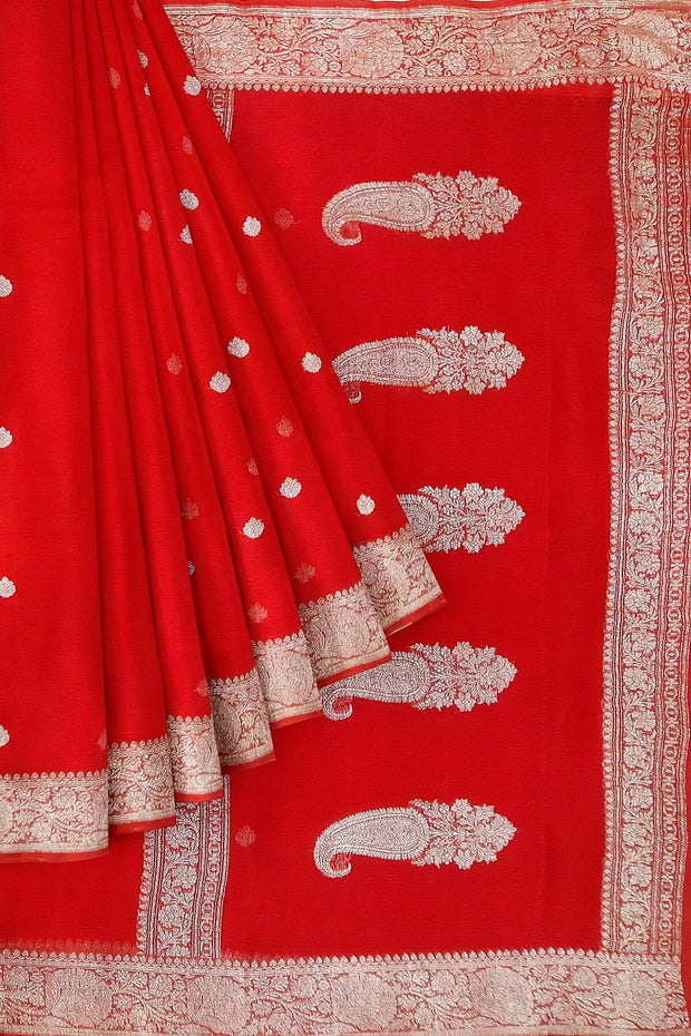 Banarasi silk chiffon  saree in red with silver  buttis &  border