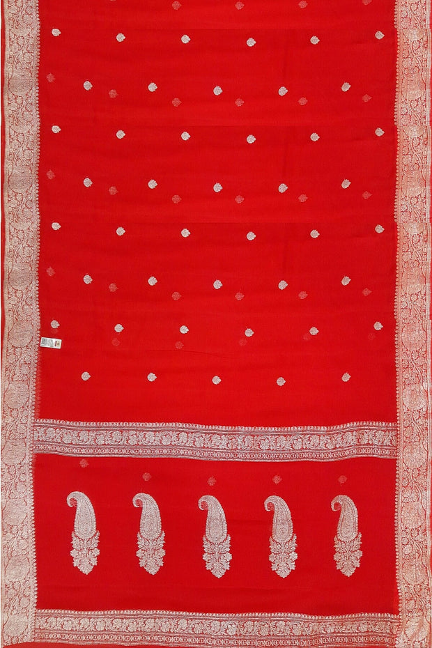 Banarasi silk chiffon  saree in red with silver  buttis &  border