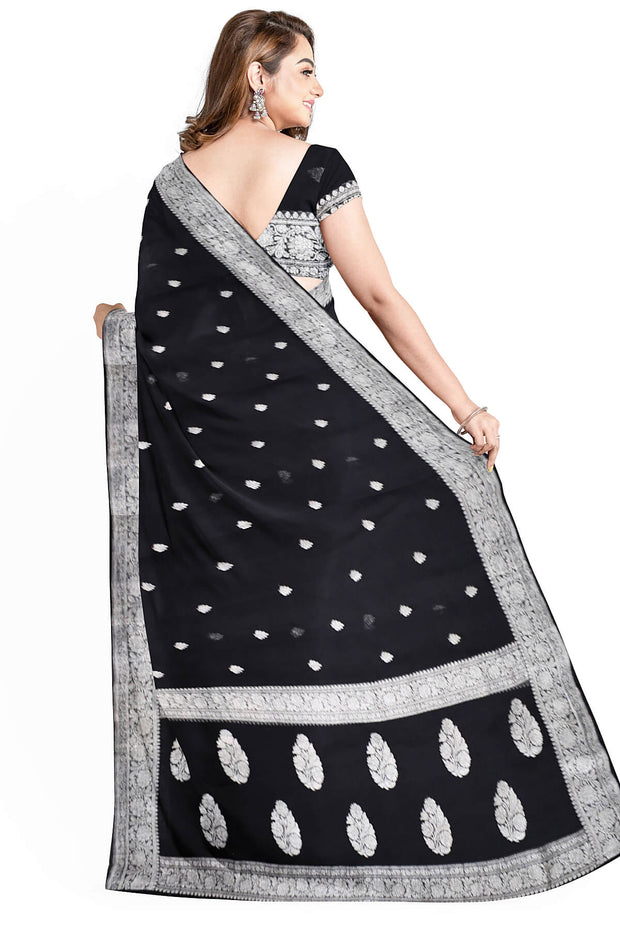 Banarasi silk chiffon  saree in black with silver  buttis &  border