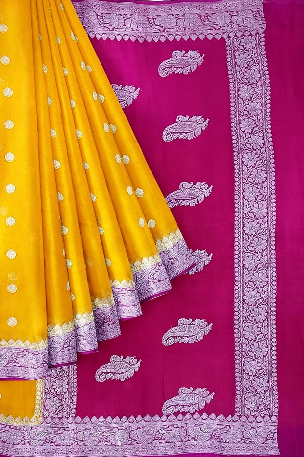 Banarasi silk chiffon  saree in mustard  with silver  buttis &  border