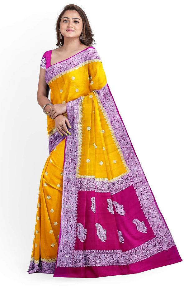 Banarasi silk chiffon  saree in mustard  with silver  buttis &  border