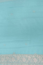 Banarasi silk chiffon  saree in sea blue  with silver  buttis &  border