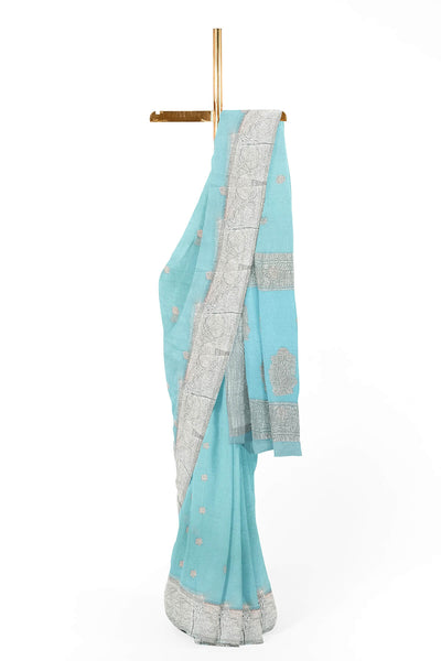 Banarasi silk chiffon  saree in sea blue  with silver  buttis &  border