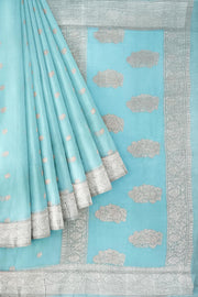 Banarasi silk chiffon  saree in sea blue  with silver  buttis &  border