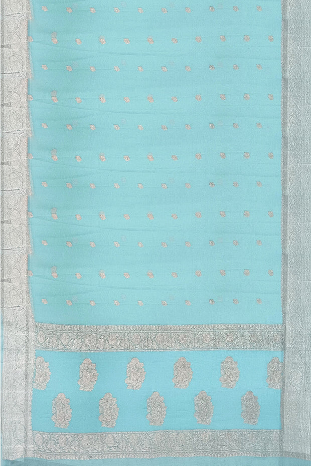 Banarasi silk chiffon  saree in sea blue  with silver  buttis &  border