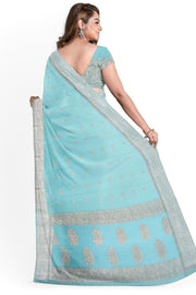 Banarasi silk chiffon  saree in sea blue  with silver  buttis &  border