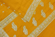 Banarasi silk chiffon  saree in yellow  with silver  buttis &  border