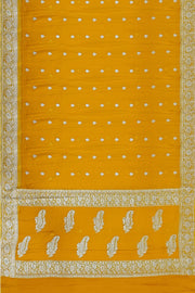 Banarasi silk chiffon  saree in yellow  with silver  buttis &  border