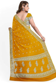 Banarasi silk chiffon  saree in yellow  with silver  buttis &  border